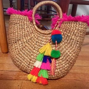 Jade tribe fringe straw bag